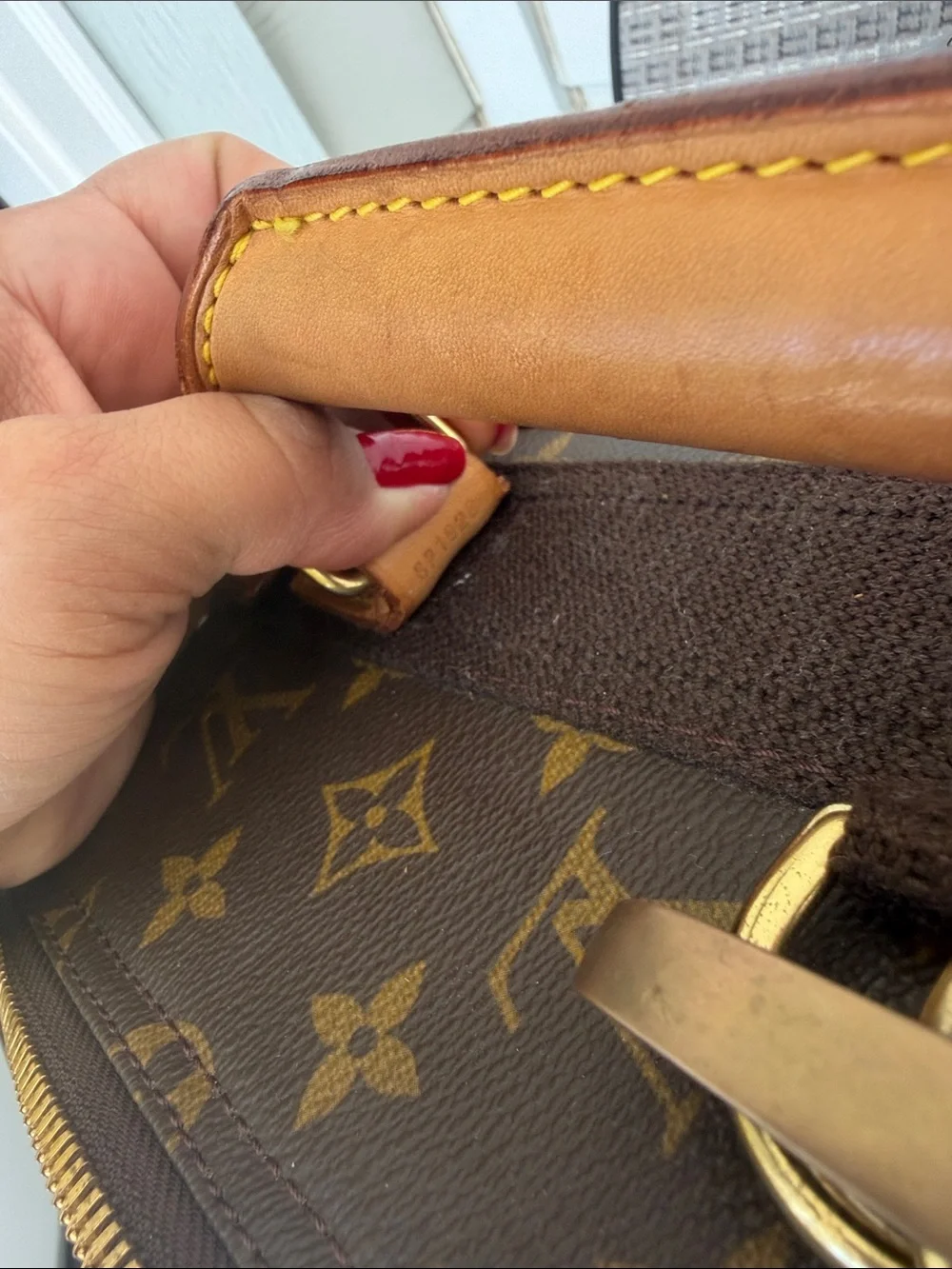 Louis Vuitton Monogram Rolling Carry-On in Brown and Tan